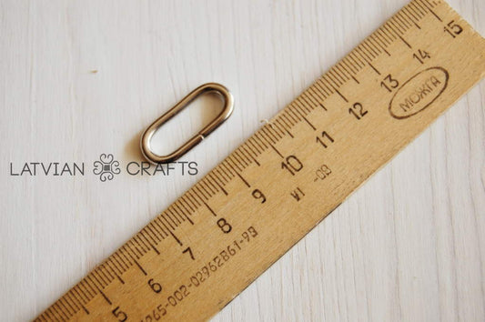 Metal oval in silver color - 2.5cm - Warehouse sale!