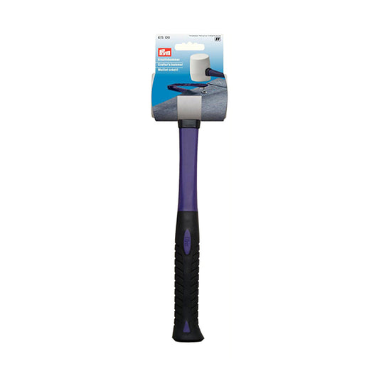 Rubber mallet for hitting push buttons