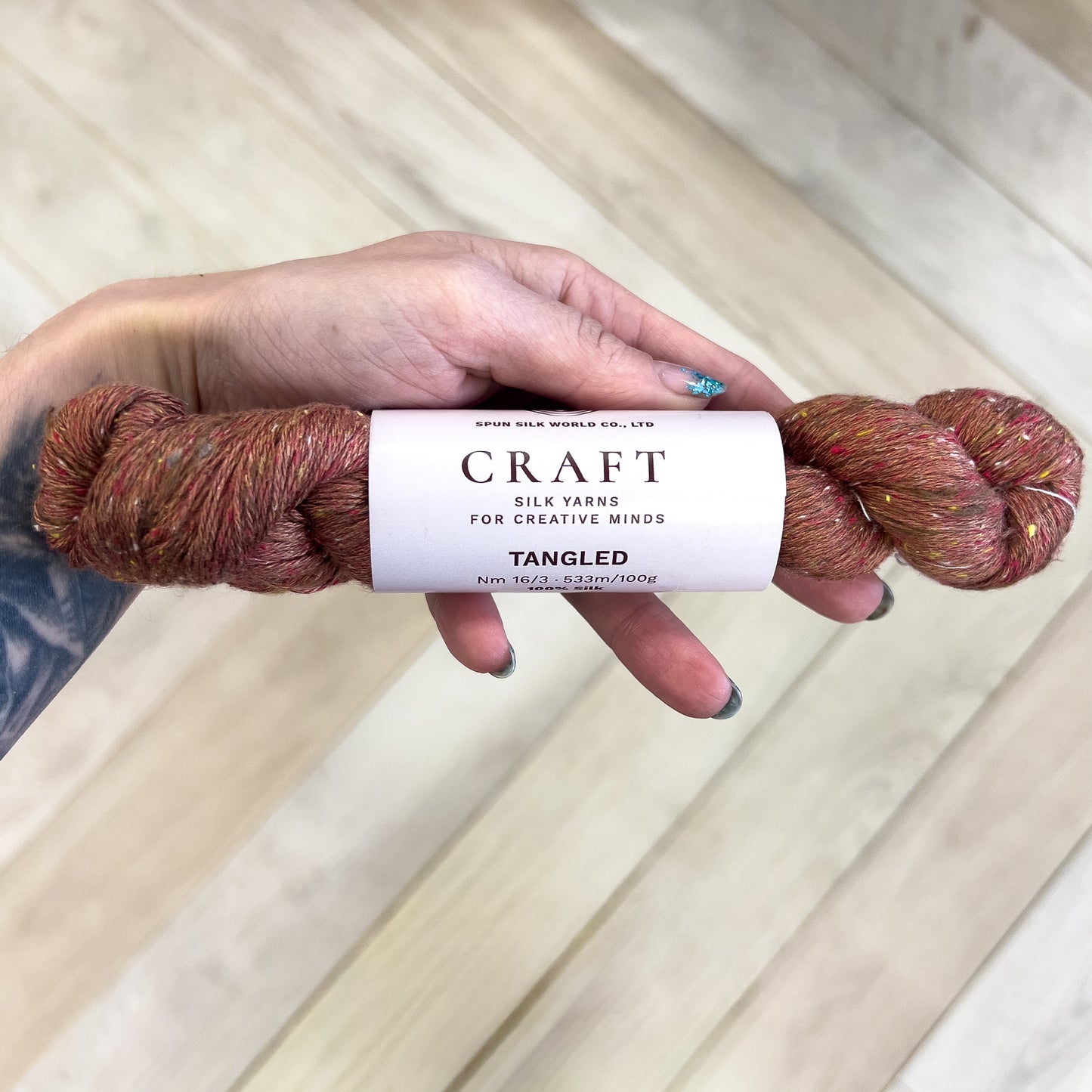 Spun Silk World TANGLED silk Nm 16/3 50g #0105 "Dzelzs garoza"